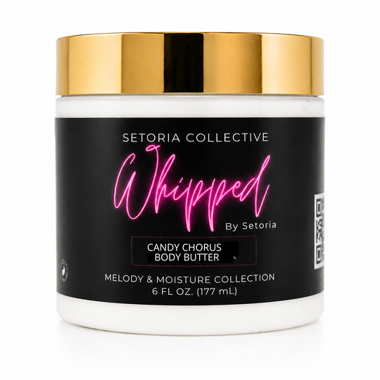 Skincare jar with black label and gold lid on a white background