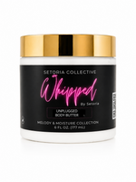 Skincare jar with black label and gold lid on a white background