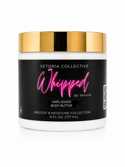 Skincare jar with black label and gold lid on a white background